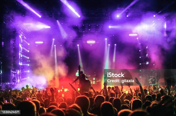Large Group Of People At A Concert Party Stock Photo - Download Image Now - Music Festival, Popular Music Concert, Stage - Performance Space