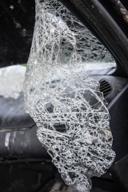 istock Broken car windshield close-up. Accident, downed crossings. Concept 1330426278