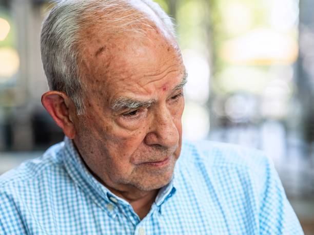 istock Sad pensive serious senior man looking down 1330427128
