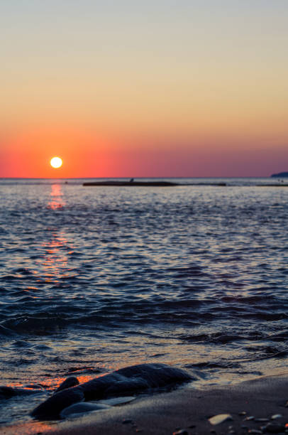 istock Amazing sea sunset, the sun, waves, clouds 1330429226