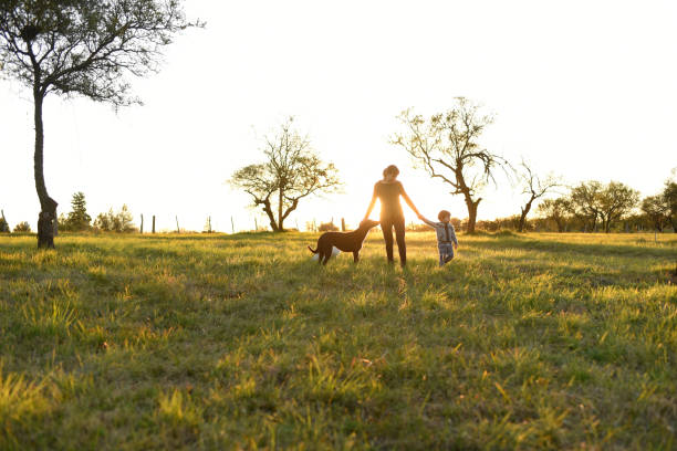 mother with child at sunset