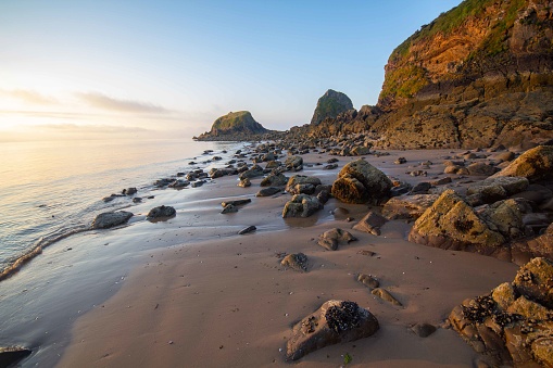 Sunrise at Monkstone Point near Saundersfoot in Wales.