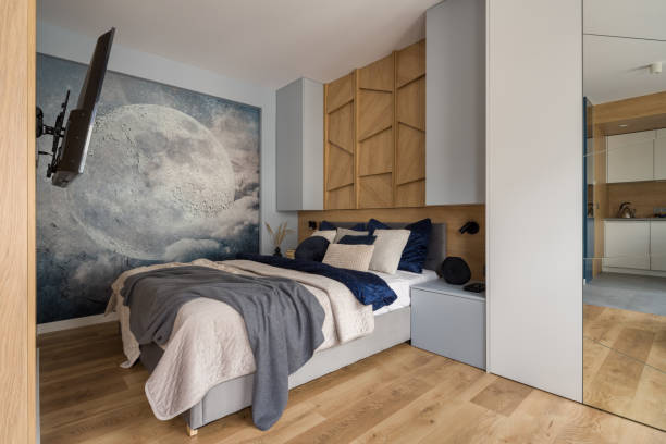 Stylish bedroom with wall decor stock photo