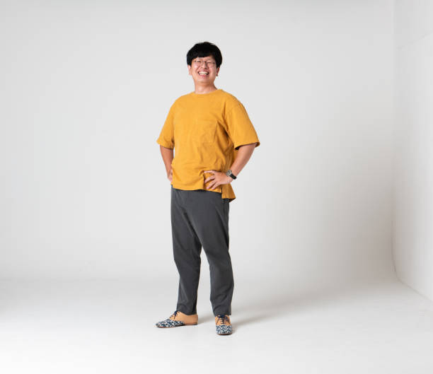 istock Japanese man dressed in yellow in front of a white background 1330453024