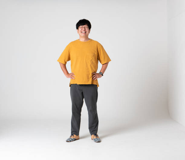 istock Japanese man dressed in yellow in front of a white background 1330453025