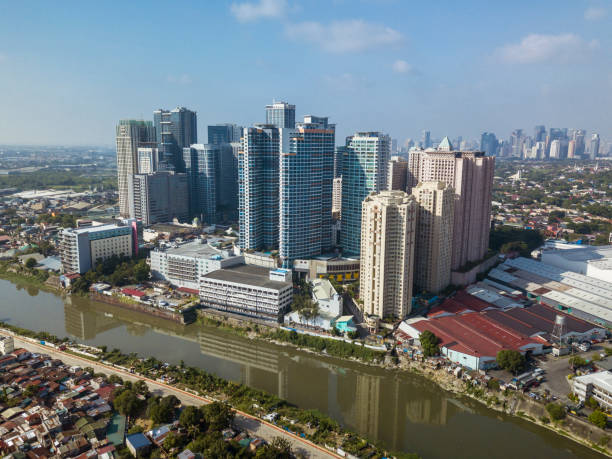 Aerial of Eastwood City and the Marikina River. Northern Metro Manila cityscape and skyline. stock photo