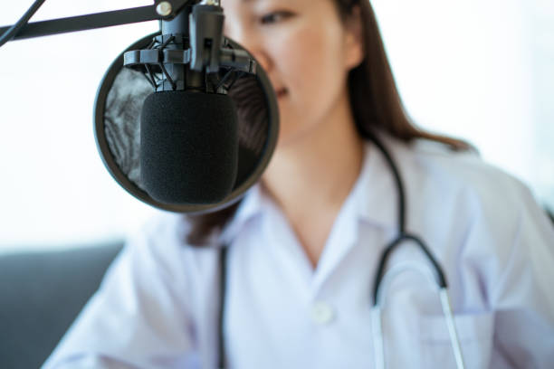 Doctor making a podcast. stock photo