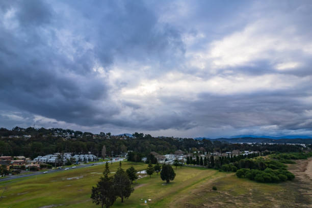 istock Rain clouds and aerial reverse sunset seascape at Corrigans Beach 1330472247