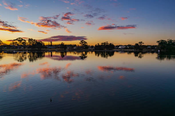 istock Ohmas Bay Sunset with Clouds and Reflections 1330472790
