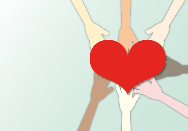 istock Group of people united diversity and unity partnership as heart hands in a group. 1330472861