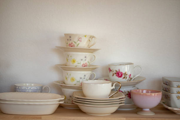istock Ceramic crockery and bowls arranged in a cabinet for home decoration. 1330473044