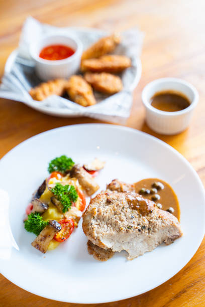 pork steak with black pepper sauce,steak