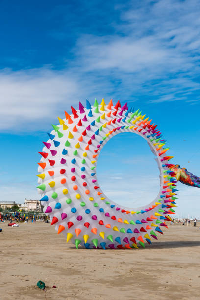 istock Colorful Kites flying over the sky 1330482603