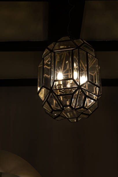 istock Light of lamp in the darkness 1330487527