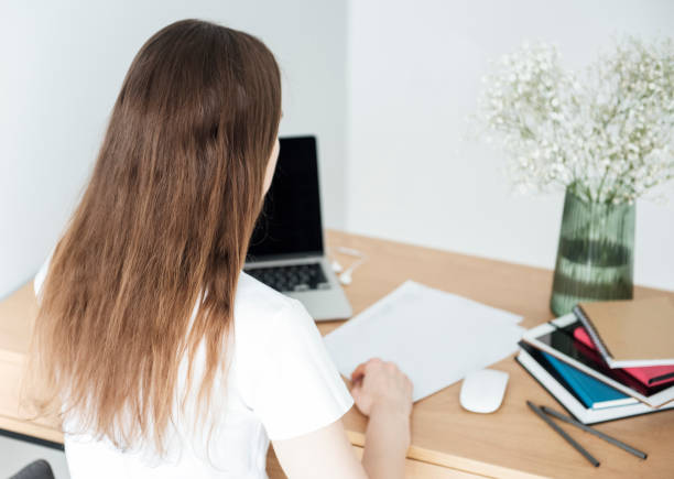 istock Young girl working at home office 1330491282