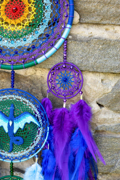 istock Handmade dream catcher with feathers threads and beads rope hanging 1330492674