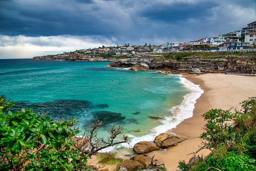 BONDI BEACH, AUSTRALIA - AUGUST 18, 2018: Tamarama Beach panorama on a stormy day