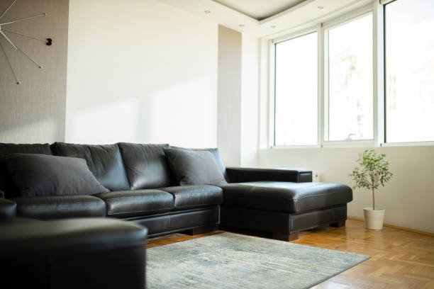 istock Stylish living room with big windows 1330497514