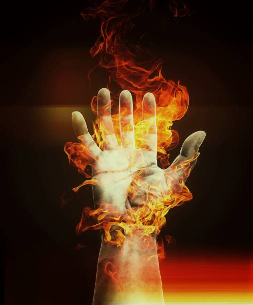 istock 3D illustration of burning fire hands 1330499299