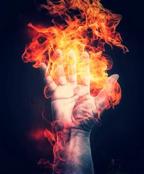 istock 3D illustration of burning fire hands 1330499300