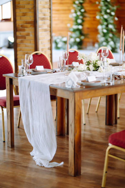 istock Luxury rich table setting for a wedding celebration, party in nice cozy restaurant. 1330499315