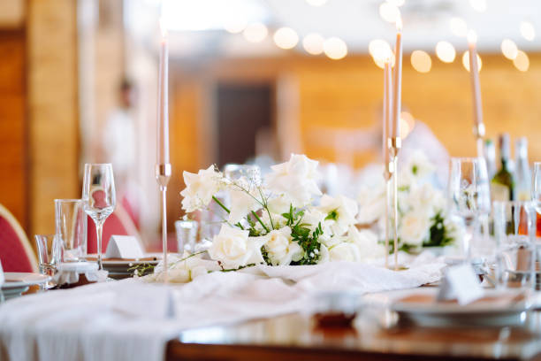 istock Luxury rich table setting for a wedding celebration, party in nice cozy restaurant. 1330499425