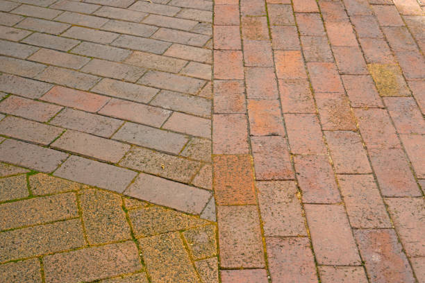 istock Rough texture and brown color of natural old brick pattern on the walkway 1330506206