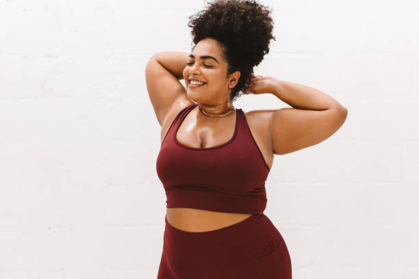 istock Body positive woman relaxing after workout 1330510287
