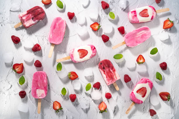 istock Berries assorted homemade popsicles on white with strawberries, raspberries cherry and blackberries 1330510390