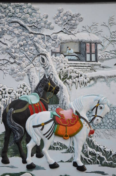 A vertical photo of a painting in a religious building in Vietnam.