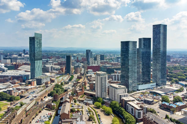 Aerial view of Deansgate, Manchester skyline, England, UK Wide angle aerial view of the skyline of Manchester, England, UK manchester england stock pictures, royalty-free photos & images