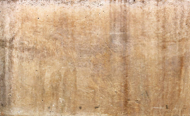 istock old blank stone wall texture background in light brown or beige color with moisture lines and notches - roman empire block 1330513358