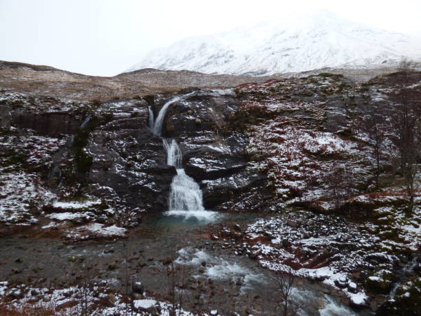 Wintery Glencoe waterfall stock photo
