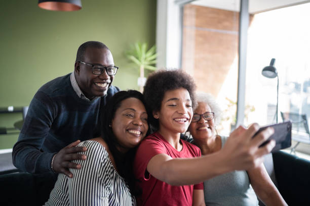 istock Multi generation family taking a selfie or doing a video call at home 1330517805