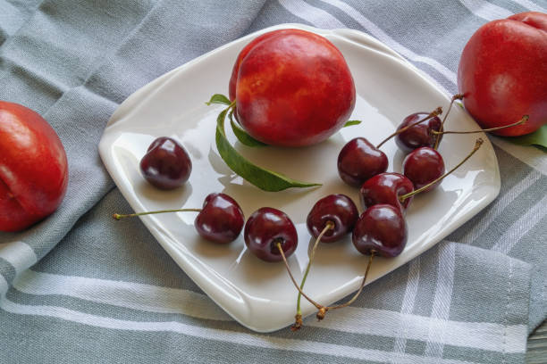 istock Red summer fruits. Cherries and nectarines 1330518754