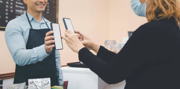 istock Mobile online payment scanning cashless concept with blank screen 1330519277