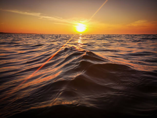 istock Orange sunset reflected in the Baltic Sea 1330519497