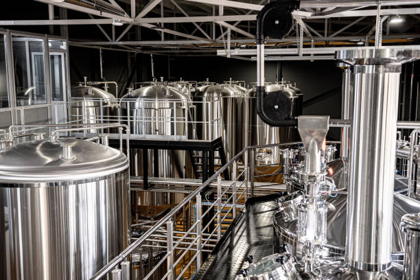 istock Craft beer brewing equipment in privat brewery 1330521553