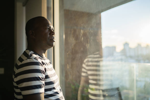 istock Mature man contemplating at home 1330522847