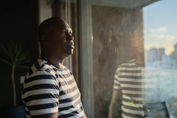 istock Mature man contemplating at home 1330522848