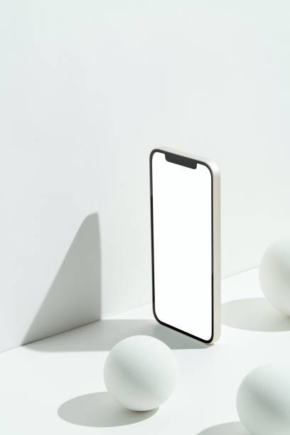 istock White blank screen smart phone mockup, template with speheres 1330526901