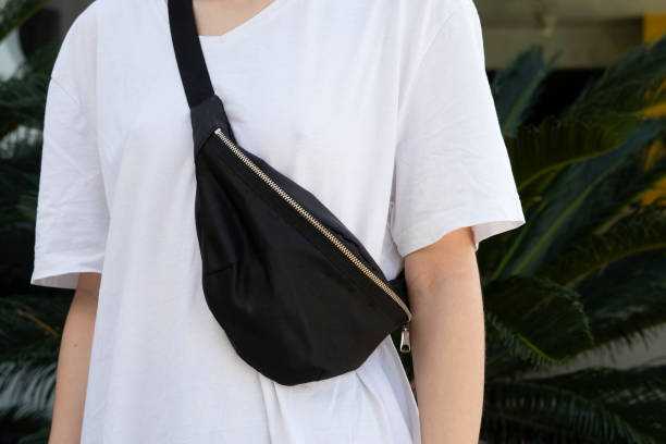 istock young beautiful woman wearing a shoulder bag (freebag) 1330529136