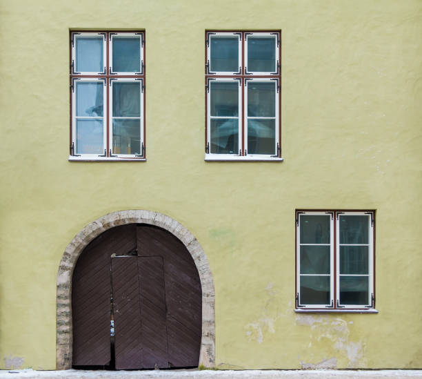 istock Windows and gate on facade of historic building 1330530402