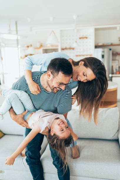 divertimento in famiglia - family cheerful happiness domestic life foto e immagini stock