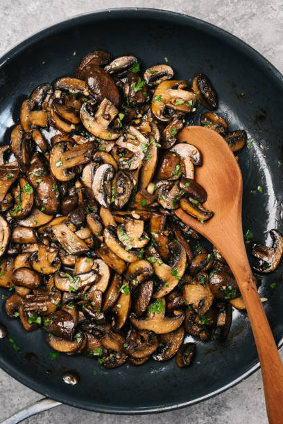 istock Sauteed Cremini mushrooms in a frying pan 1330532574