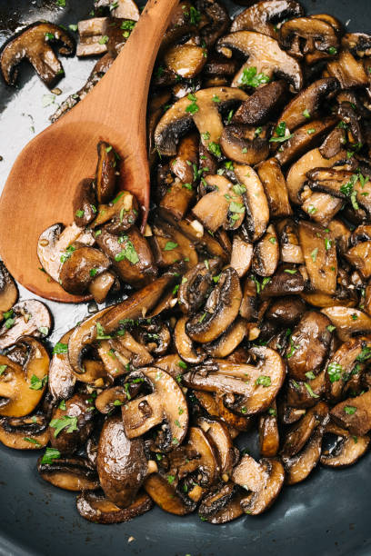istock Sauteed Cremini mushrooms in a frying pan 1330532584