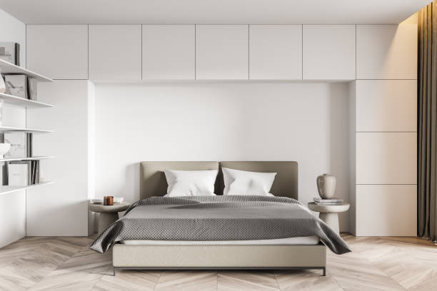 istock Stylish minimalistic white bedroom interior 1330535356