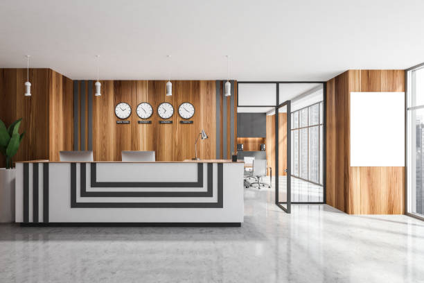 istock Reception desk in wooden office with clocks 1330537257