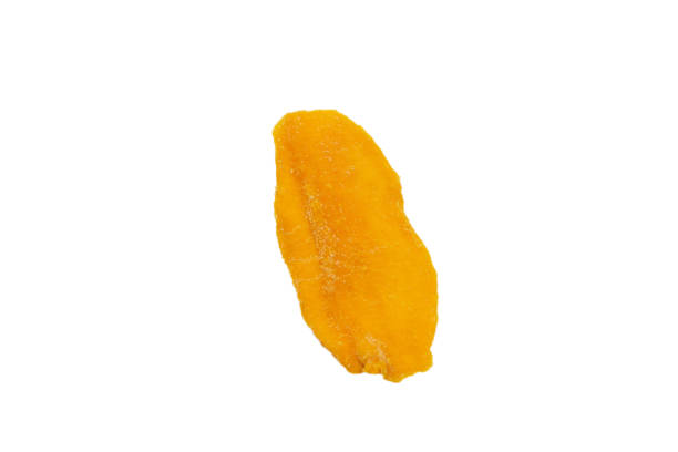 istock Dry tasty mango slices isolated on a white background. 1330539794