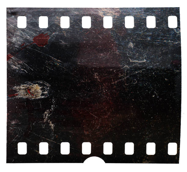 istock underexposed film snip or strip on white. 1330540003